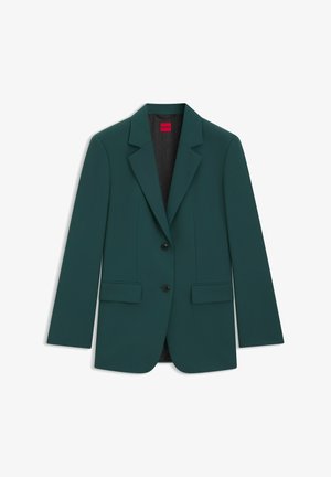 Teal blazer made of structured fabric. Features two front pockets, notch lapels, and two buttons. Lined with a patterned interior.
