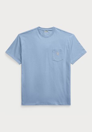 Light blue cotton t-shirt with a crew neck and short sleeves. Features a chest pocket with a small embroidered logo. Soft texture.