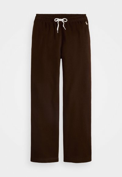 Brown sweatpants with an elastic waistband and drawstring. Features a white logo accent and straight leg design. Soft, textured fabric.