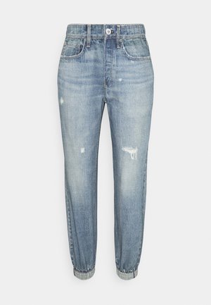 Lyseblå denim joggingbukser med elastiske manchetter og diskrete sliddetaljer på forsiden af lårene og lommerne.