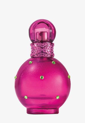 Flacon de parfum rond rose vif avec un col texturé et de petites décorations vertes semblables à des bijoux sur le corps sur fond blanc.
