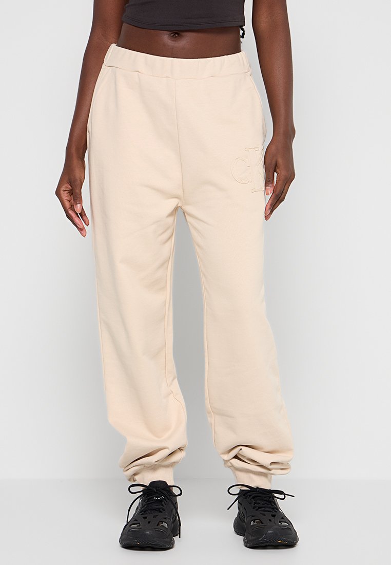 Calvin Klein Jeans Trainingsbroek zandkleur Calvin Klein Jeans Trainingsbroek zandkleur