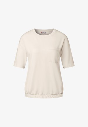 T-shirt crème à manches courtes, avec col rond, poche avant discrète et ourlet élastique. Fabriqué en tissu lisse, offrant une coupe décontractée.