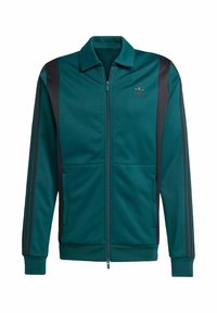 Teal træningsjakke med sorte striber, lynlåslukning og krave. Har sidelommer og et logo på brystet. Fremstillet af glat stof.