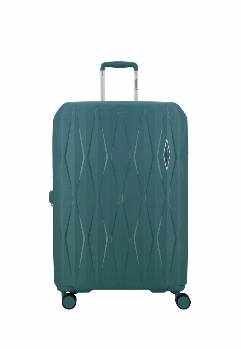 Valigia rigida color turchese con motivi geometrici, quattro ruote girevoli e un manico telescopico estensibile.