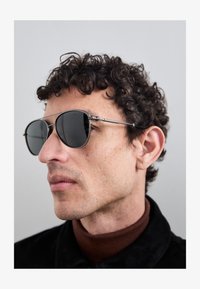 Selecionado, grigio