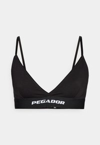 Black bralette with triangular cups, thin adjustable straps, and a wide elastic band featuring "PEGADOR" in white lettering. Smooth texture.