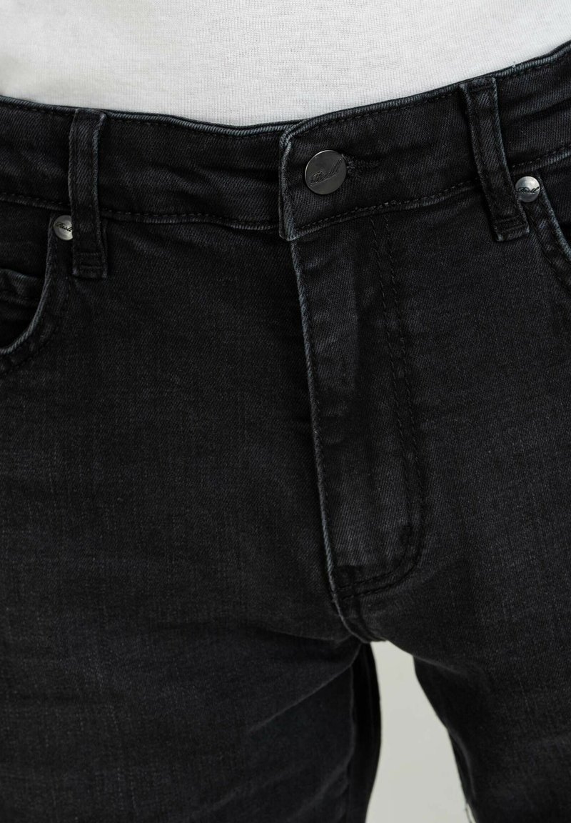 Reell BARFLY - Vaqueros Rectos - Black Wash/negro Jaspeado