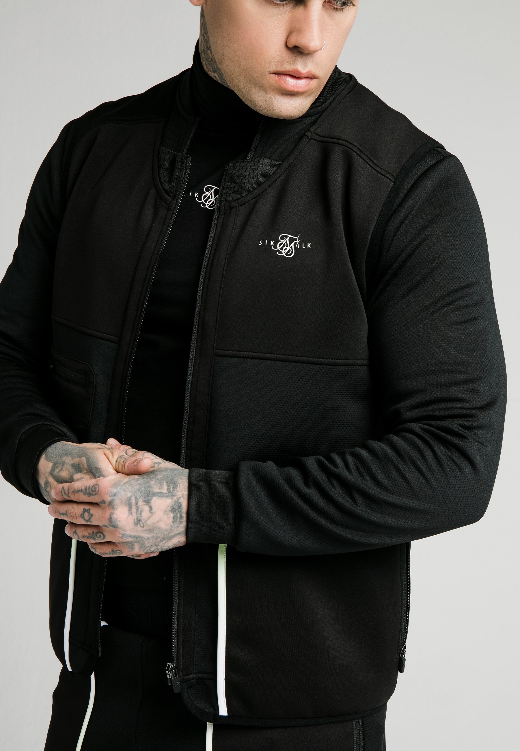 SIKSILK Chaleco - black \u0026 fluro white/negro - Zalando.es