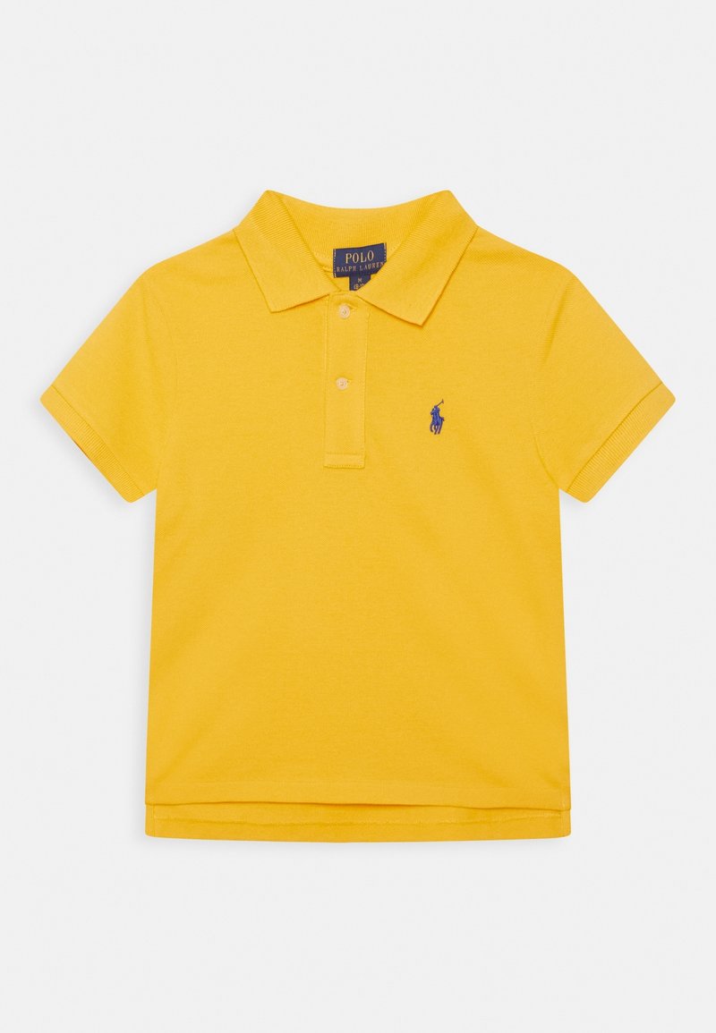 Keltainen polo-paita, jossa on klassinen kaulus, lyhyet hihat ja kolme nappia. Pienen sinisen logon brodeeraus vasemmassa rintapielessä. Puuvillamateriaali.