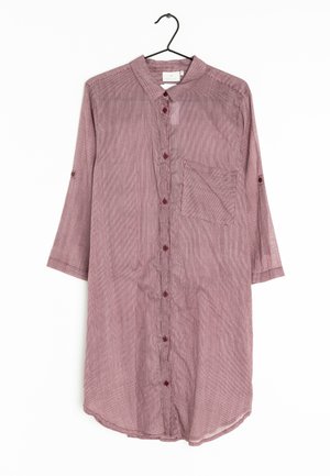 Long-sleeve, button-up mauve shirt dress with front pocket, collar, and rolled sleeves hanging on black hanger against white background.