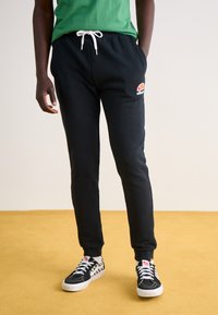 Ellesse - OVEST - Pantaloni de trening - anthracite Imagine miniatură 1