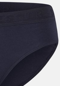 Slipper bikini in misto cotone blu navy con una cintura elastica testurizzata con lettering in rilievo, tessuto morbido e design classico.