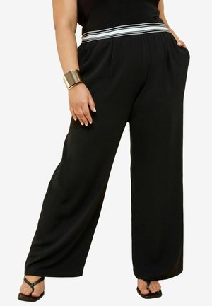 Schwarze weit geschnittene Hosen aus glattem Material mit einem gestreiften elastischen Bund. Taschen auf beiden Seiten erhöhen die Funktionalität.