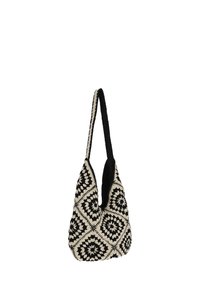 Geantă croșetată în negru și crem, cu un model distinctiv în formă de diamant, o formă lăsată și o curea lungă pentru umăr. Textură moale pe întreaga suprafață.