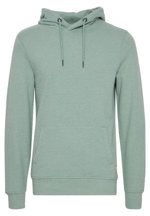 Svetlozelená mikina vyrobená z mäkkého materiálu, s klokaním vreckom, nastaviteľnou kapucňou so šnúrkou a rebrovanými manžetami a lemom.