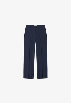 Jūras zilas bikses ar krokoto priekšpusi, taisnām kājām un divām sānu kabatām. Izgatavotas no gluda, viegla auduma.