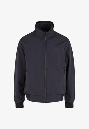 Vīriešu tumši zilā jakā ar augstu apkakli, priekšējo rāvējslēdzēju un divām sānu kabatām. Izgatavota no gludas, izturīgas auduma ar ribotām piedurknēm.