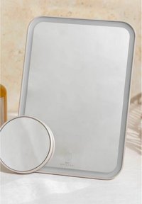 Rectangular mirror with a metallic edge in light silver, accompanied by a smaller round mirror. Smooth surface, simple design, no patterns.