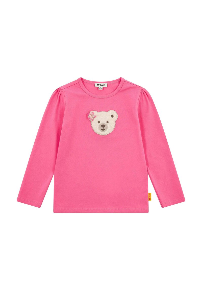 Maglietta a maniche lunghe rosa con spalle a sbuffo, caratterizzata da un'applicazione di una faccia d'orso e dettagli floreali sul petto. Materiale in cotone morbido.