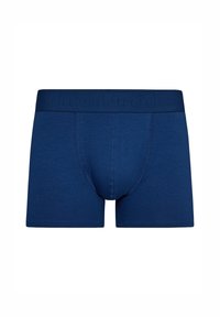 Pantalones cortos de boxeo azul marino hechos de una tela suave, con un pouch contorneado, cintura elástica con logo en relieve y costuras planas para mayor comodidad.