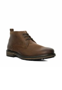 Brown leather ankle boot with lace-up design, rounded toe, and a textured surface. Features a contrasting rubber sole and minimal detailing.