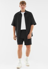 Johnny Urban MASON - Tepláky - black