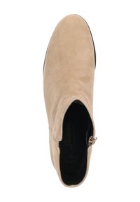 Bottine en suède beige, à bout arrondi, avec fermeture éclair sur le côté et doublure intérieure lisse. Semelle en caoutchouc plate pour un confort optimal.