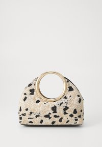 Beige and black spotted handbag with a textured fabric, rounded gold-tone ring handle, and a structured, curved shape.