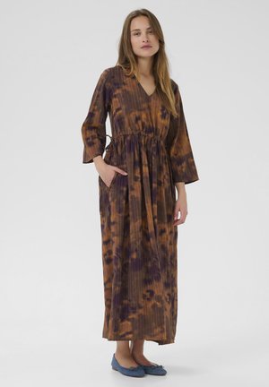 Brown and purple tie-dye maxi dress with a V-neck, long sleeves, elastic waist, and side pockets. The fabric has a ribbed texture.