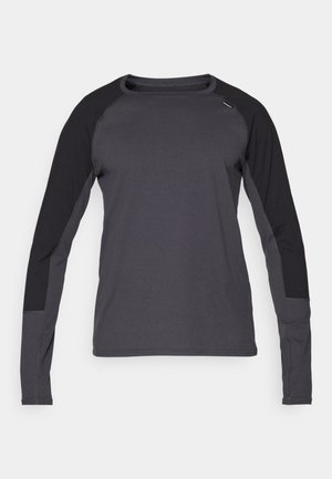 Maglietta a maniche lunghe in grigio scuro e nero. Presenta maniche raglan a contrasto e un girocollo. Tessuto liscio con dettagli minimi.