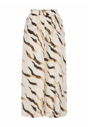 Bukser med vide ben og elastik i taljen, med hvid bund og sorte, brune og tan bølgede abstrakte striber.