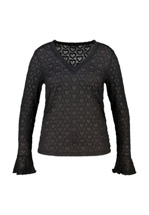 Blouse noire à manches longues avec col en V en dentelle, motifs en forme de cœur et poignets évasés, tissu semi-transparent.