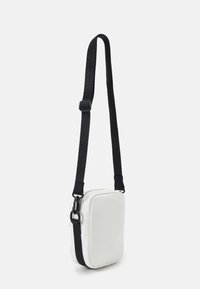 Calvin Klein Jeans CROSSBODY BUCKLE BAG UNISEX - Borsa a tracolla - bright white