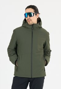 Khaki hættejakke med en glat, struktureret overflade, frontlynlås og sidelommer. Sammen med reflekterende, oversized solbriller.