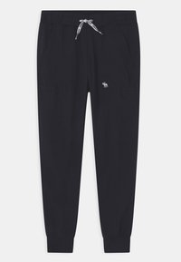 Tmavě námořnické joggingové kalhoty z měkké bavln�ěné směsi, s elastickým pasem a nastavitelnou šňůrkou, dvěma bočními kapsami a malým logem.