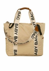 Beige polsterēta soma ar platām "BABY BAG" siksnām, brūnu ādas akcentu un ar rāvējslēdzēju aizdari. Iezīmējas ar plašu kori un sānu kabatu.