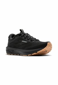 Sneaker nera da uomo con tomaia in rete testurizzata, punta rotonda e suola in gomma naturale dotata di un battistrada multidirezionale.