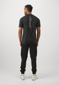 Ellesse LENTRINA PANT - Treningo apatinė dalis - black