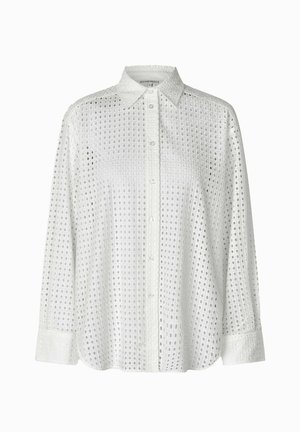 White cotton shirt with a button-down collar, featuring an openwork design of small squares, long sleeves, and a loose fit.