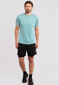 Rukka YLIKIIKA - T-shirt de sport - grün