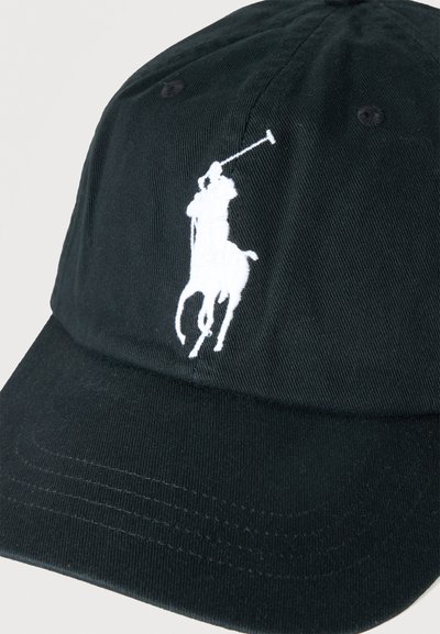 Black baseball cap with white embroidered logo of a polo player riding a horse and swinging a mallet.