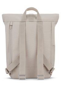 Beige roll-top backpack made of durable fabric, featuring adjustable straps, a side zip pocket, and metal hardware accents.
