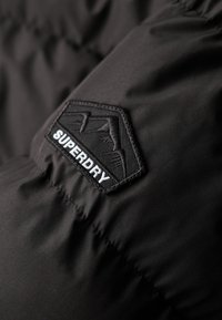 HOODED PUFFER - Winterjas - black