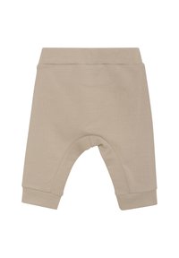 Pantalons en coton beige pour tout-petits, avec une coupe décontractée, présentant une jambe fuselée, une taille à bords côtelés et des poignets pour un ajustement confortable.