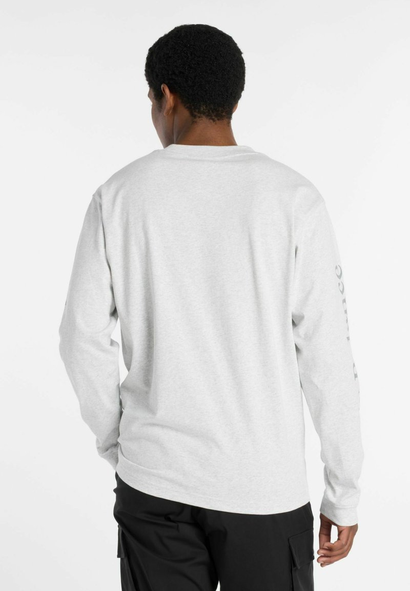 Long-sleeve gray t-shirt with crew neck. Features printed text on the left sleeve. Soft texture, straight hem, and relaxed fit.