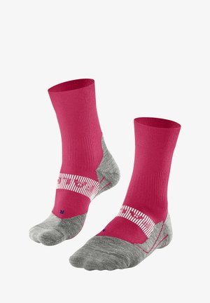 Calze rosa con accenti grigi. Tessuto a coste, suola imbottita, banda a righe nella parte centrale con logo. Design alto alla caviglia adatto per lo sport.