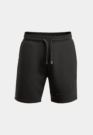 Pantaloni sportivi neri con vita elasticizzata, cordino, tasca laterale e tessuto liscio. Progettati per comfort e mobilità.