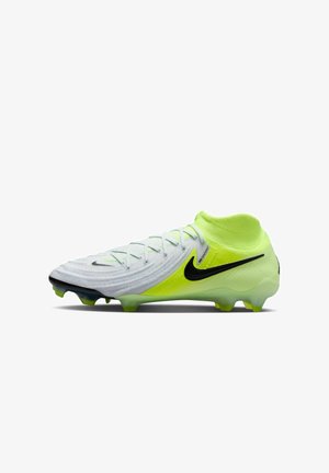 Crampon de football Nike en gris clair et jaune vif. Doté d'une tige texturée, de fermetures à lacets et d'un swoosh noir. Conçu pour une traction sur l'herbe.