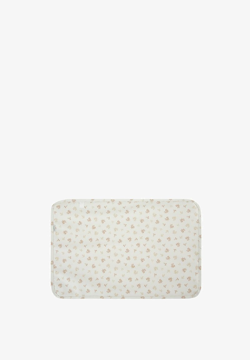 Cambiador rectangular para bebés con fondo crema y pequeño patrón floral naranja, esquinas redondeadas y bordes cosidos.